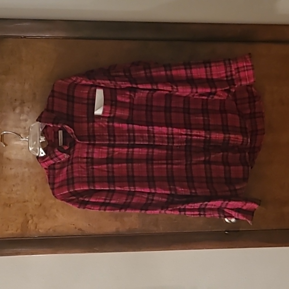 Red and black plaid button-down flannel shirt